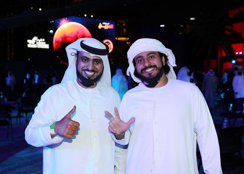 Dubai, United Arab Emirates - Reporter: Sarwat Nasir. News. Mars Mission. People celebrate at an event at Burj Park to celebrate the Hope probe going into orbit around Mars. Tuesday, February 9th, 2021. Dubai. Chris Whiteoak / The National