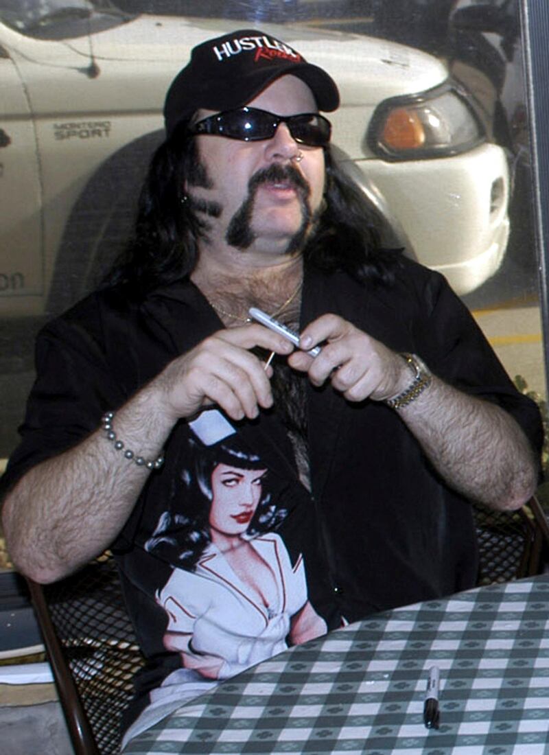 FILE - In this May 20, 2004 file photo shows Vinnie Paul Abbott in Amarillo, Texas.  Paul, co-founder and drummer of metal band Pantera, has died at 54.  Panteraâ€™s official Facebook page posted a statement early Saturday, June 23, 2018 announcing his death. Paulâ€™s representative confirmed the death to Billboard. No cause of death was mentioned.  Paulâ€™s real name was Vincent Paul Abbott. He and his brother, Dimebag Darrell, formed Pantera in 1981.(AP Photo/Ralph Duke, File)