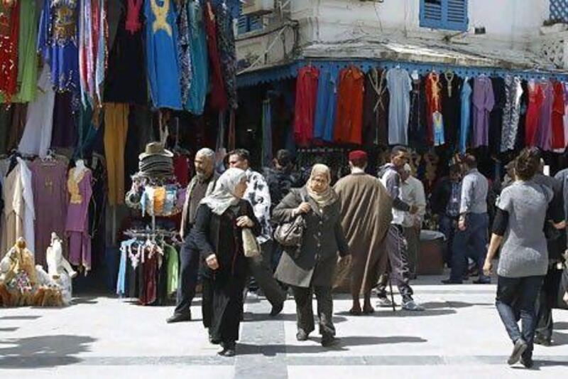 Shoppers in the Kasbah souk in Tunis. The Tunisian economy shrank by 1.8 per cent last year. Zoubeir Souissi / Reuters