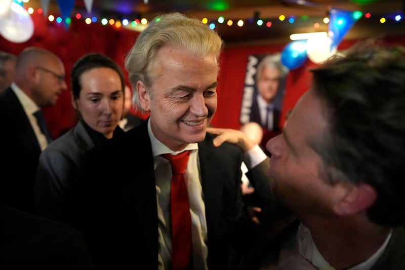 Mr Wilders talks to his supporters in The Hague. AP