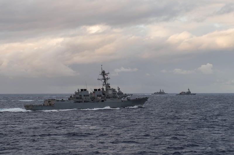 160121-N-NT265-031 WATERS NEAR GUAM (Jan. 21, 2016) – The forward-deployed Arleigh Burke-class guided-missile destroyer USS McCampbell (DDG 85) moves into formation with Japan Maritime Self Defense Force ships during Guam Exercise 2016. McCampbell is on patrol in the 7th Fleet area of operations in support of security and stability in the Indo-Asia Pacific. (U.S. Navy photo by Mass Communication Specialist 2nd Class Christian Senyk/Released)