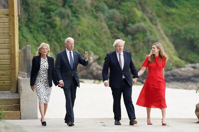 Britain's Prime Minister Boris Johnson, his wife Carrie Johnson and U.S. President Joe Biden with first lady Jill Biden walk outside Carbis Bay Hotel, Carbis Bay, Cornwall, Britain June 10, 2021. REUTERS/Kevin Lamarque