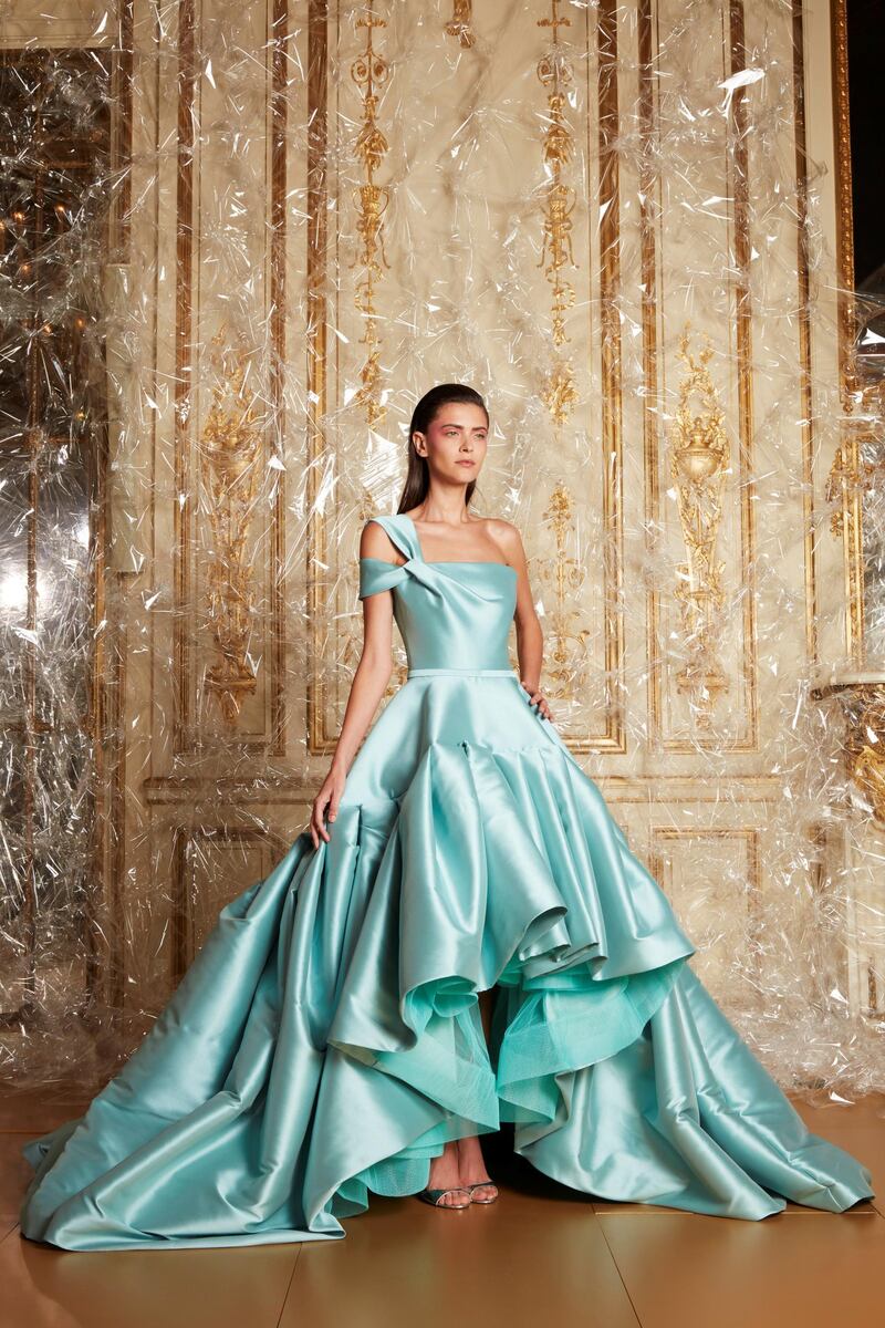 An architectural mint green duchesse satin dres