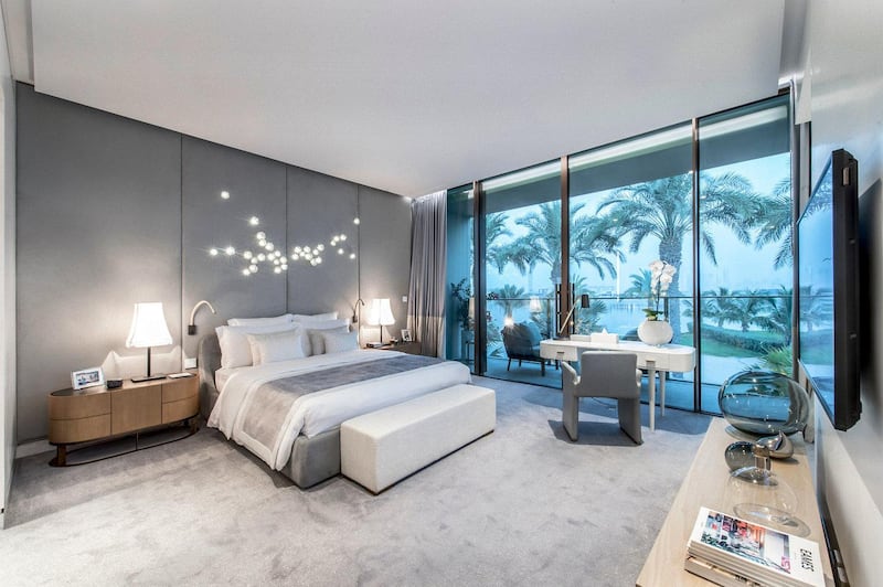 A master bedroom with a ceramic installation by Isabelle Poupinel. Courtesy The Royal Atlantis Residences & Resort