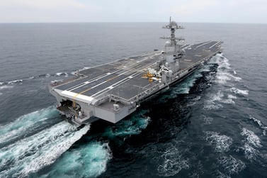 US aircraft carriers have long been a common sight in Gulf waters, but changing priorities after the election could see them sail home. AP