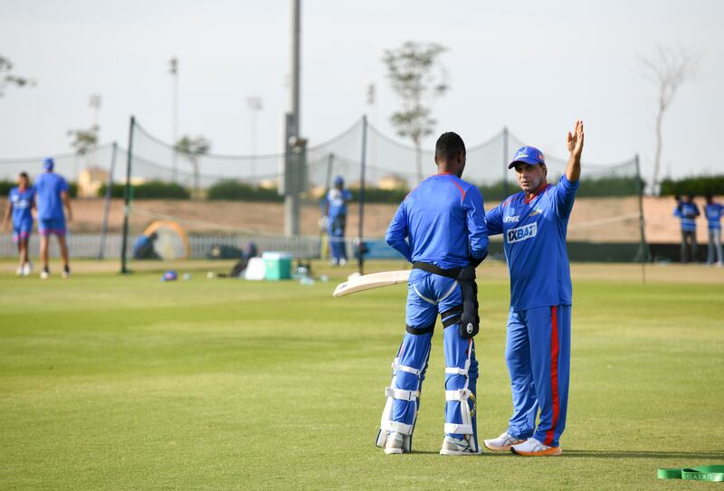 Robin Singh, MI Emirates coach at the ILT20, leads a training session at Zayed Cricket Stadium, in Abu Dhabi. Khushnum Bhandari / The National

