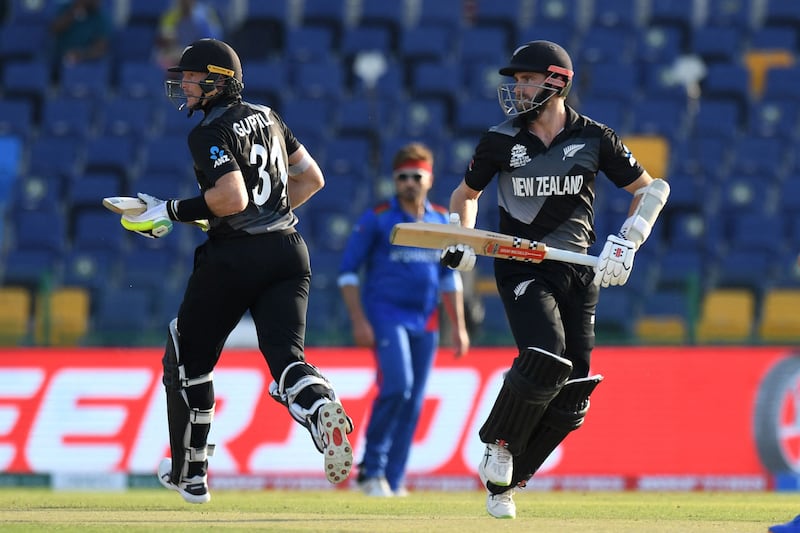 New Zealand's captain Kane Williamson, right, and Martin Guptill during the T20 World Cup match against Afghanistan at the Zayed Cricket Stadium in Abu Dhabi on Sunday, November 7, 2021. AFP