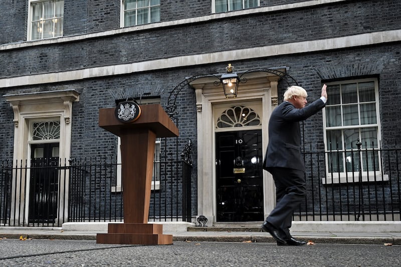 Boris Johnson walks away from his dark wood lectern after delivering a farewell address in Downing Street in September. Getty Images