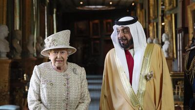 The UK's Queen Elizabeth II with Sheikh Khalifa in Windsor Castle in 2013. AFP 