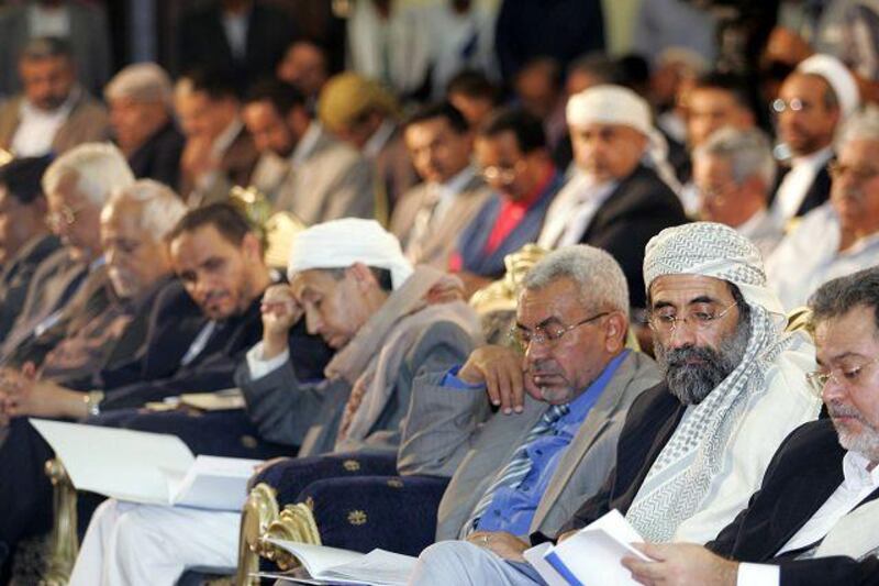 Yemeni opposition leaders attend a news conference held by the National  Dialogue Committee yesterday in Sana'a.