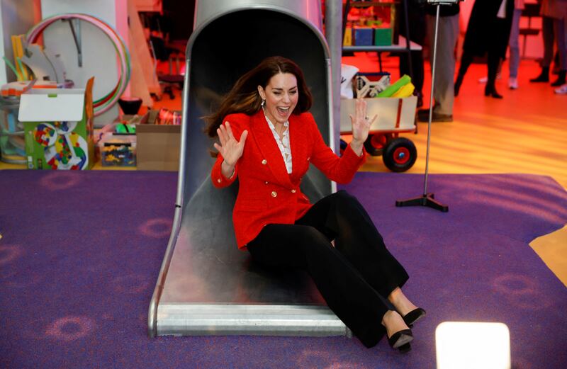 Catherine enjoys a slide during a visit to the Lego Foundation PlayLab in Copenhagen, Denmark, in February 2022