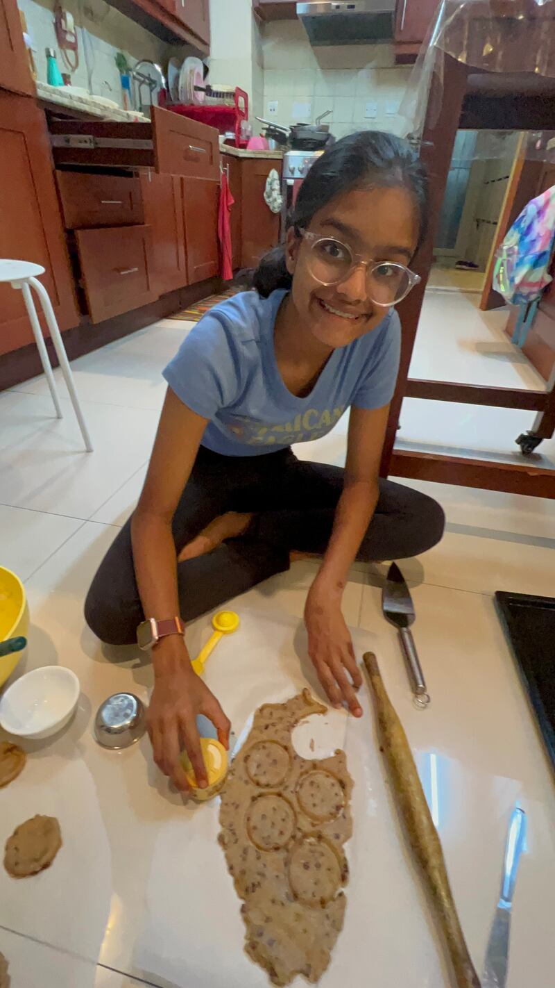 Kyra, a Year 9 pupil at Jumeirah College, bakes cookies for earthquake survivors in Turkey and Syria. Photo: Cherry Pachisia