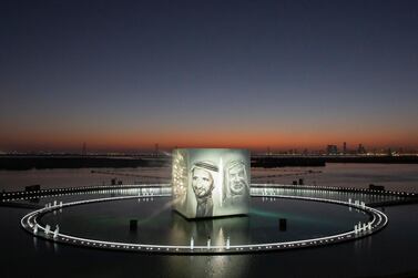 Images of UAE Founding Father Sheikh Zayed and Sheikh Rashid, former Dubai Ruler, are shown during the Seeds of the Union National Day show at Jubail Mangrove Park. Courtesy: Sheikh Mohamed bin Zayed Twitter