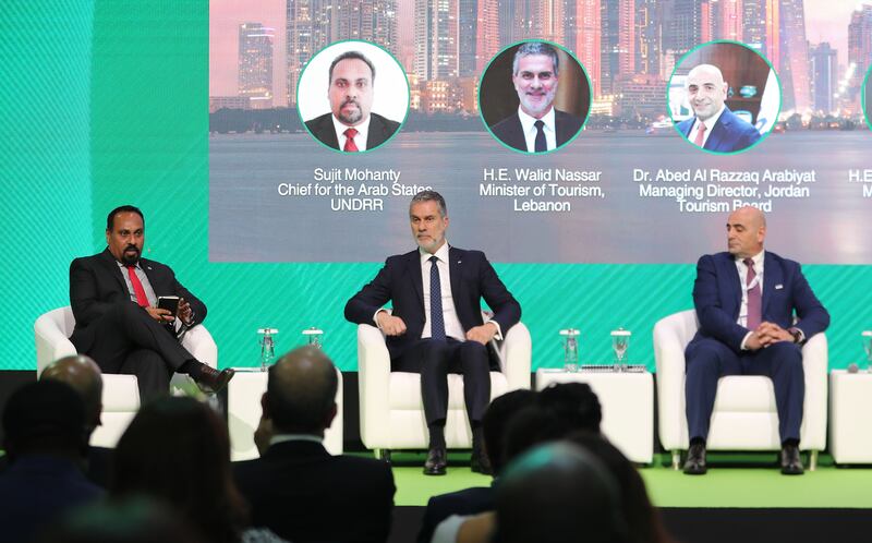 Walid Nassar, Lebanese Minister of Tourism, centre, attends a ministerial discussion at the Arabian Travel Market in Dubai. Pawan Singh / The National