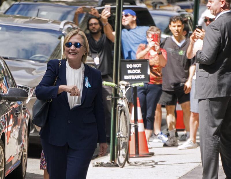Democratic presidential candidate Hillary Clinton leaves her daughter’s apartment building in New York on September 11, 2016. Craig Ruttle / AP Photo