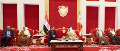 A handout picture released by Bahrain's official news agency (BNA) shows Bahrain's King Hamad bin Isa Al Khalifa (C-R) meeting with Egypt's President Abdel Fattah El Sisi (C-L) in the capital Manama, on June 28, 2022.  Bahrain News Agency / AFP