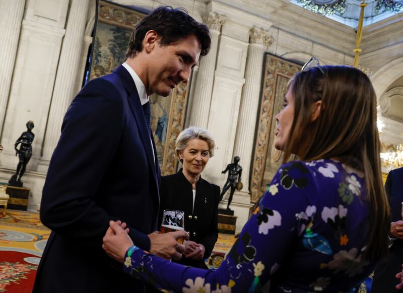 Canada's Prime Minister Justin Trudeau and European Commission President Ursula von der Leyen attend a reception at the Royal Palace in Madrid. AP