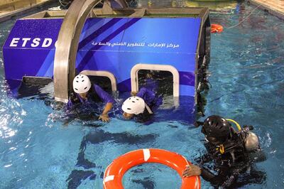 Recruits had to learn how to escape from a sinking aircraft during pilot training.
