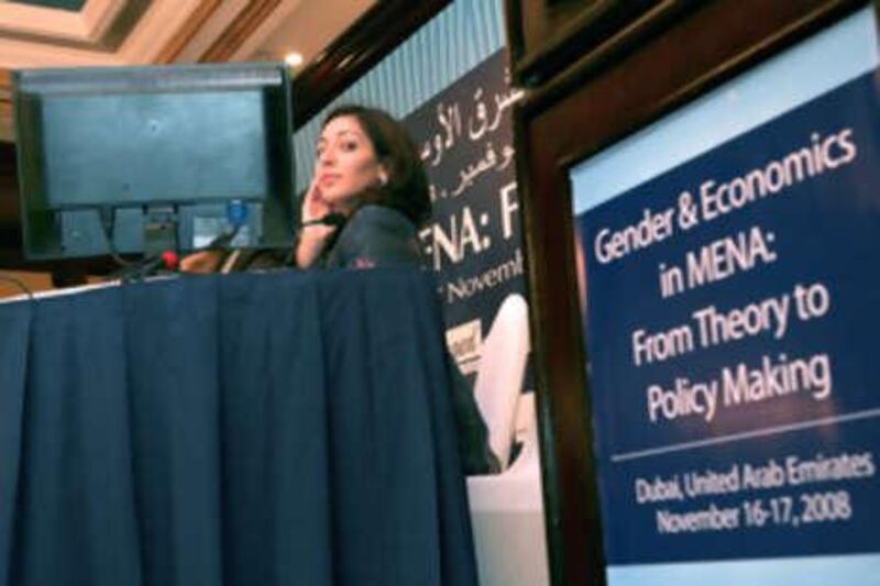 DUBAI-NOVEMBER 17,2008 - May Al dabbagh, Dubai School of Goverment, Director Gender and Public Policy Program,UAE gestures during press briefing on Gender and Economics in MENA: From Theory to Policy Making  Forum held at Movenpick hotel in Dubai. ( Paulo Vecina/The National ) *** Local Caption ***  PV Forum 5.jpg *** Local Caption ***  PV Forum 5.jpg