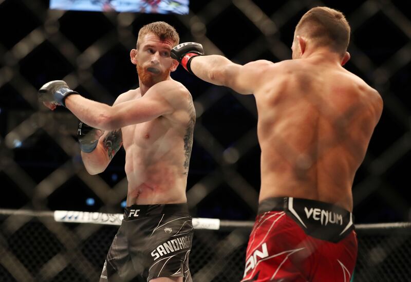 UFC interim bantamweight bout between Cory Sandhagen (blue) and Petr Yan (red) at UFC 267. Etihad Arena, Yas Island, Abu Dhabi