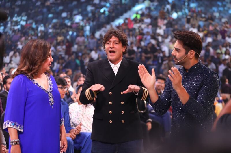 Hosts Farah Khan Kunder and Aparshakti Khurana share a light moment with actor Chunky Panday. 