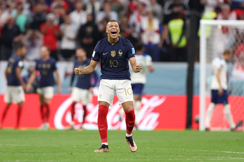 Kylian Mbappe celebrates after Harry Kane misses a penalty. Getty