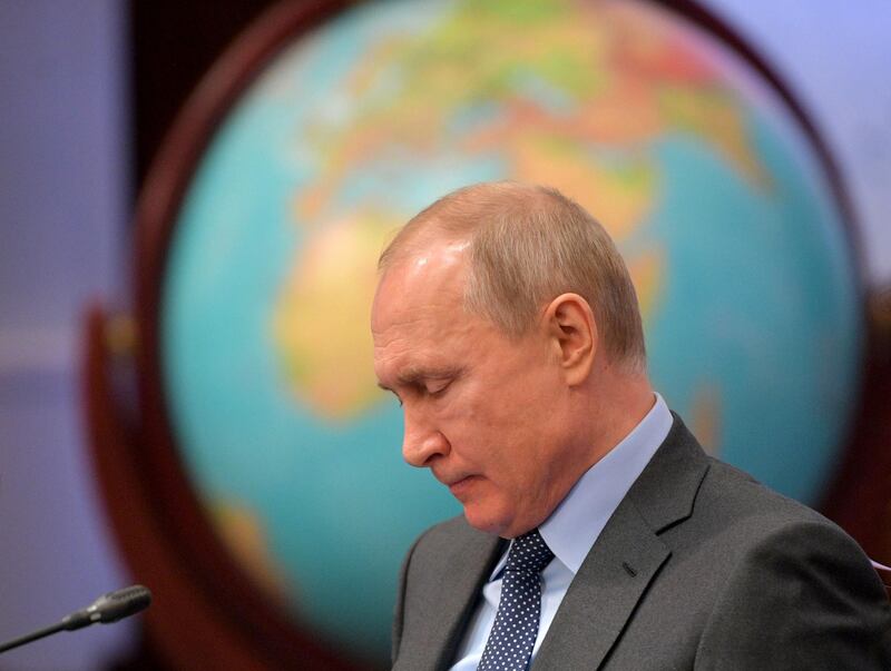 Russian President Vladimir Putin attends a meeting of guardian council of the Russian Geographic Society in St. Petersburg, Russia, Tuesday, April 23, 2019.  Putin said the government will pursue an ambitious navy modernization effort. (Alexei Druzhinin, Sputnik, Kremlin Pool Photo via AP)