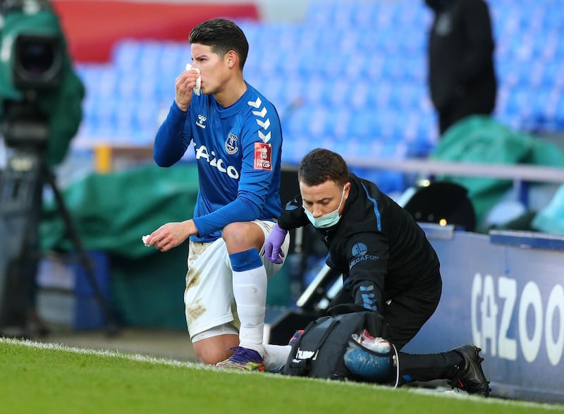 Everton's James Rodriguez after taking a ball in the face. PA