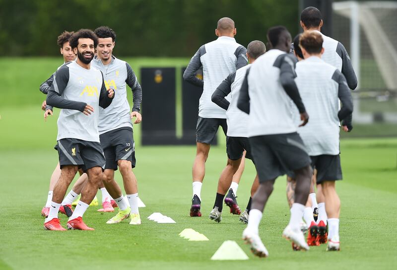 Mohamed Salah training with Liverpool teammates. Getty