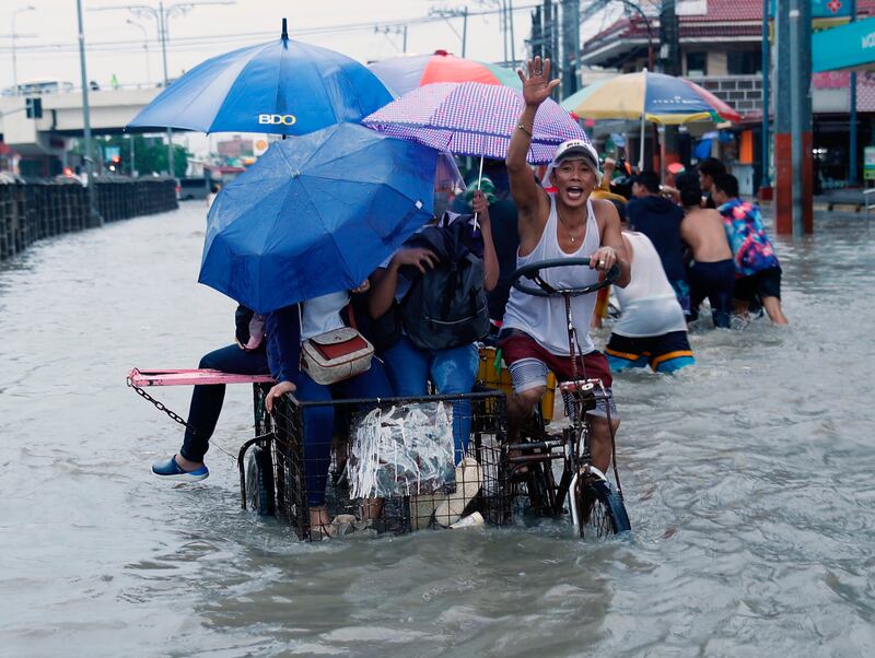 Typhoon Fabian exacerbated heavy monsoon rains in the Philippines.