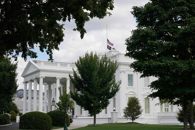 The US flag above the White House in Washington is lowered to honour the passing of Britain's Queen Elizabeth. AFP