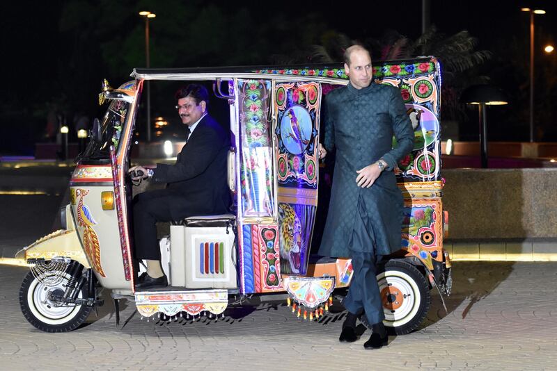 Britain's Prince William, the Duke of Cambridge and disembarks from a Tuk-Tuk in Islamabad, Pakistan. The royal couple is on an official five-day visit to Pakistan. It is the first royal visit to the country in 13 years.  EPA