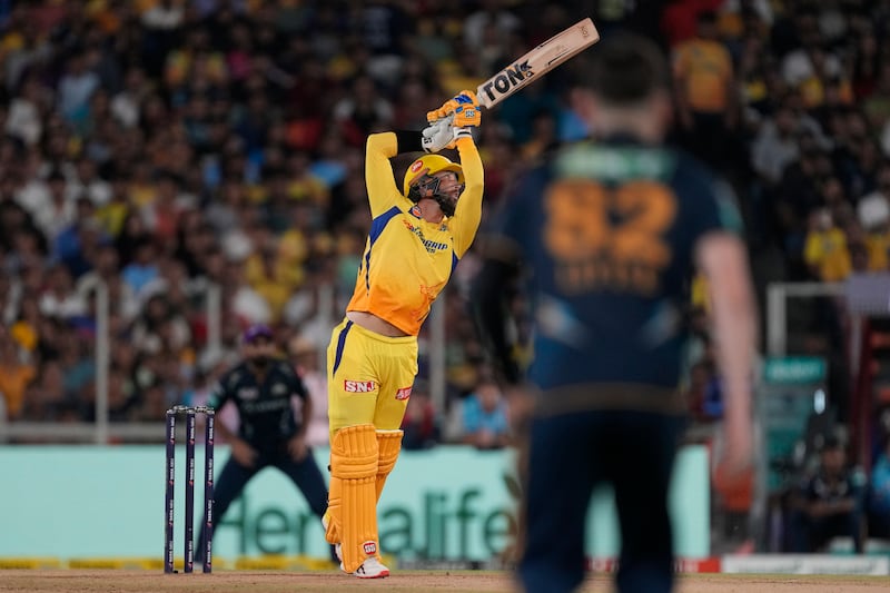 Chennai Super Kings' Devon Conway plays over the top. AP 