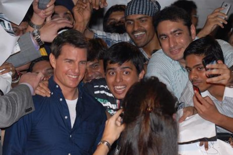Tom Cruise poses in Mumbai. Divyakant Solanki / EPA