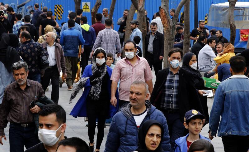 Iranians, some wearing protective masks, gather inside the capital Tehran's grand bazaar, during the Covid-19 coronavirus pandemic crises, on March 18, 2020. Iran said its novel coronavirus death toll surpassed 1,000 today as President Hassan Rouhani defended the response of his administration, which has yet to impose a lockdown.
The COVID-19 outbreak in sanctions-hit Iran is one of the deadliest outside China, where the disease originated.
 / AFP / -
