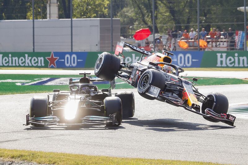 Red Bull driver driver Max Verstappen collides with Mercedes' Lewis Hamilton during the Formula One Italian Grand Prix at Monza on Sunday, September 12. EPA