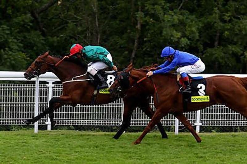 Royston Ffrench and Sea Lord get the better of Frankie Dettori and Invisible Man at Goodwood yesterday.