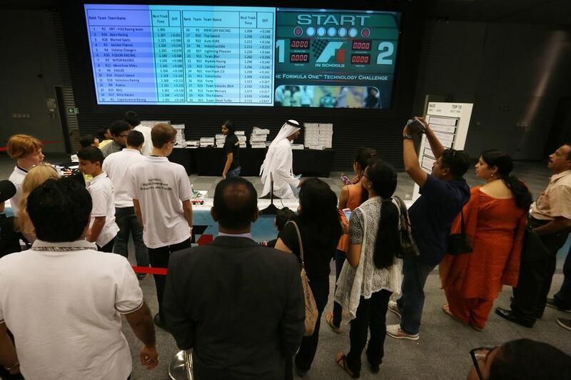 Students, teachers and parents have all eyes on the board during the finals at Yas Marina Circuit.