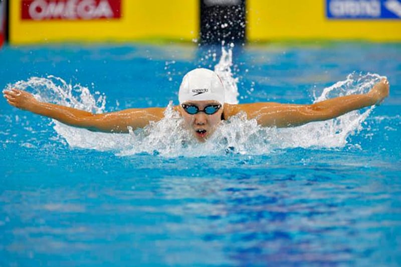 October 08. Wang Junyao (CHN) during the womens 200m Butterfly at the Fina/Arena Swimming World Cup 2011 held at the Hamdan bin Mohammed Al Rashid Sport Complex. October 08, Dubai, United Arab Emirates (Photo: Antonie Robertson/The National)