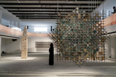 Talin Hazbar's 'Transient: A Brief Stay' and Zeinab Alhashemi's glass-and-steel work 'Metamorphic'. Courtesy Louvre Abu Dhabi
