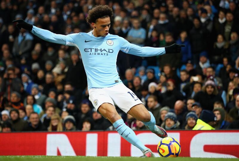 MANCHESTER, ENGLAND - DECEMBER 16:  Leroy Sane of Manchester City takes a corner during the Premier League match between Manchester City and Tottenham Hotspur at Etihad Stadium on December 16, 2017 in Manchester, England.  (Photo by Clive Brunskill/Getty Images)