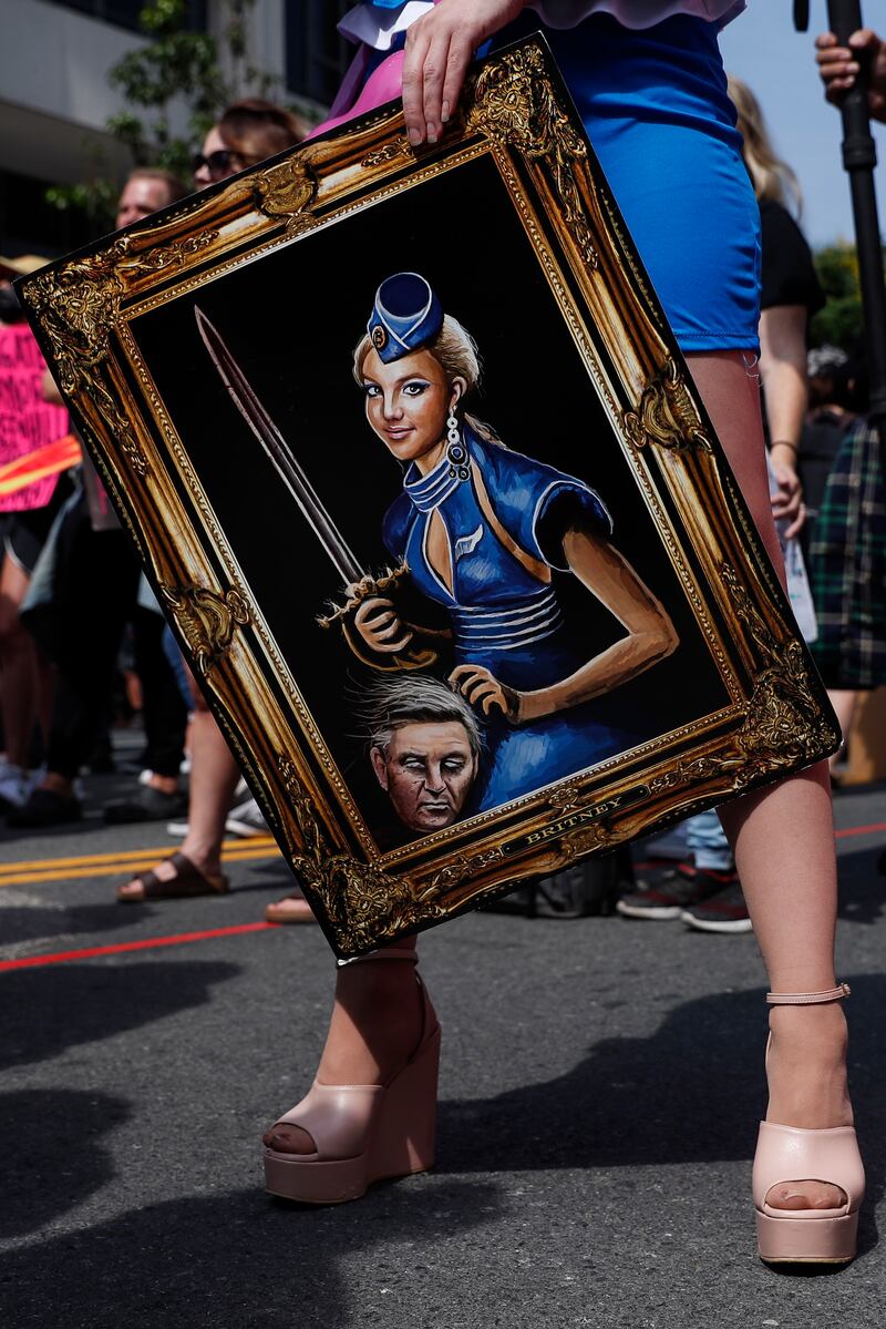 Supporters turned up with artworks of Britney. EPA