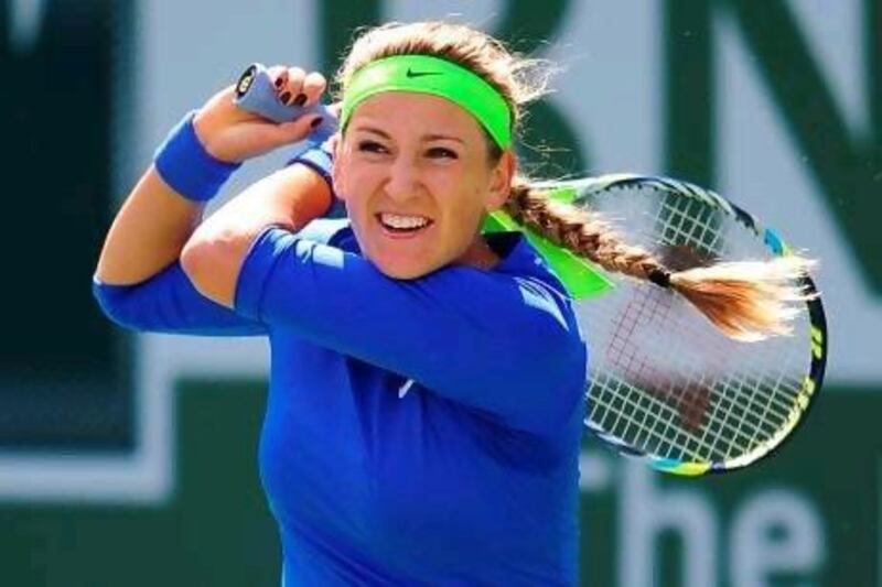 Victoria Azarenka beat Maria Sharapova of Russia in the final of the BNP Paribas Open at the Indian Wells Tennis Garden on Sunday. Robyn Beck / AFP