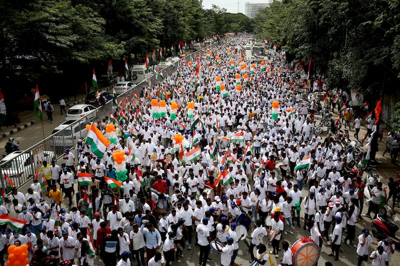 Members of the Karnataka Pradesh Congress Committee take part in a march to commemorate India's Independence Day. EPA