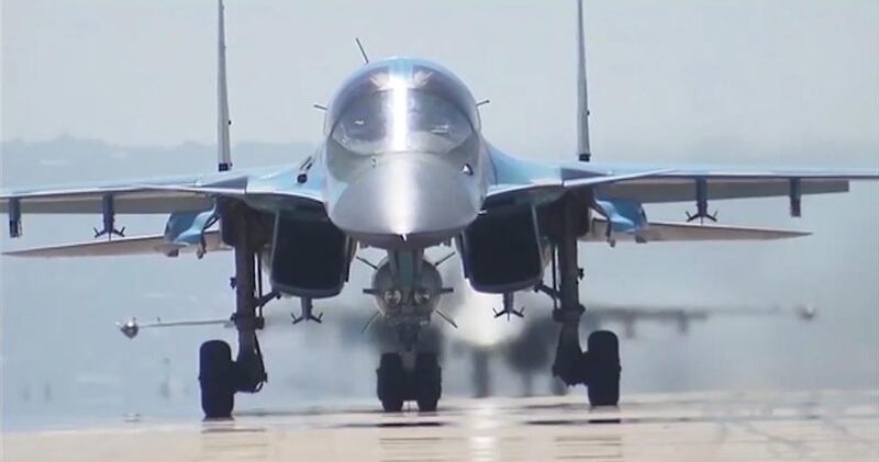 A Russian SU-34 bomber takes off from Moscow's Hmeimin airbase in Syria. Russia will maintain the airbase following its planned withdrawal. Russian Defence Ministry / EPA