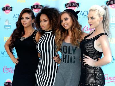 Members of the British girl group "Little Mix" pose as they arrive at the Teen Choice Awards at the Gibson amphitheatre in Universal City, California August 11, 2013. REUTERS/Fred Prouser (UNITED STATES - Tags: ENTERTAINMENT) *** Local Caption ***  LAB30_USA-_0812_11.JPG