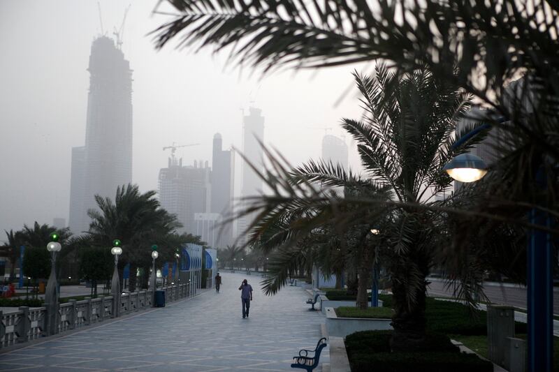 United Arab Emirates - Abu Dhabi - July 1st, 2010:  Joggers and bicyclists use the Corniche for exercising before the sun rises over the cities skyline.  (Galen Clarke/The National) for istabsir