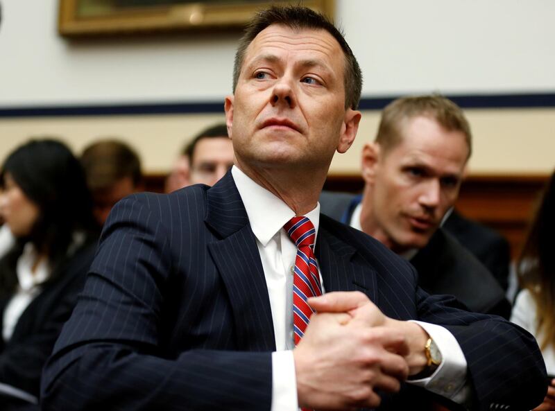 FILE PHOTO:   FBI Deputy Assistant Director Peter Strzok is seated prior to testifying before House Committees on the Judiciary and Oversight & Government Reform joint hearing on "Oversight of FBI and DOJ Actions Surrounding the 2016 Election” in Washington, U.S., July 12, 2018.  REUTERS/Joshua Roberts/File Photo