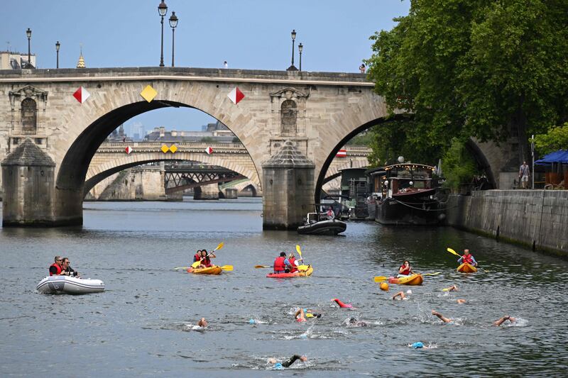 The Seine in Paris will reopen to swimmers, as well as host Olympic events. AFP