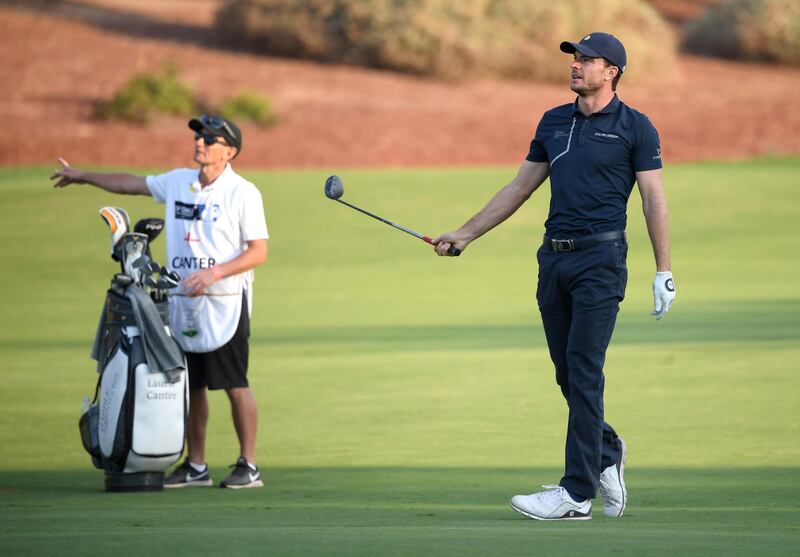 Laurie Canter of England plays his second shot on the 18th hole. Getty